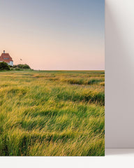 After Hover: Leuchtturm bei Sonnenuntergang