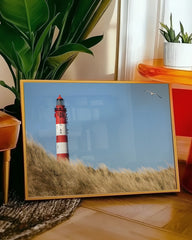 After Hover: Leuchtturm an Dünen